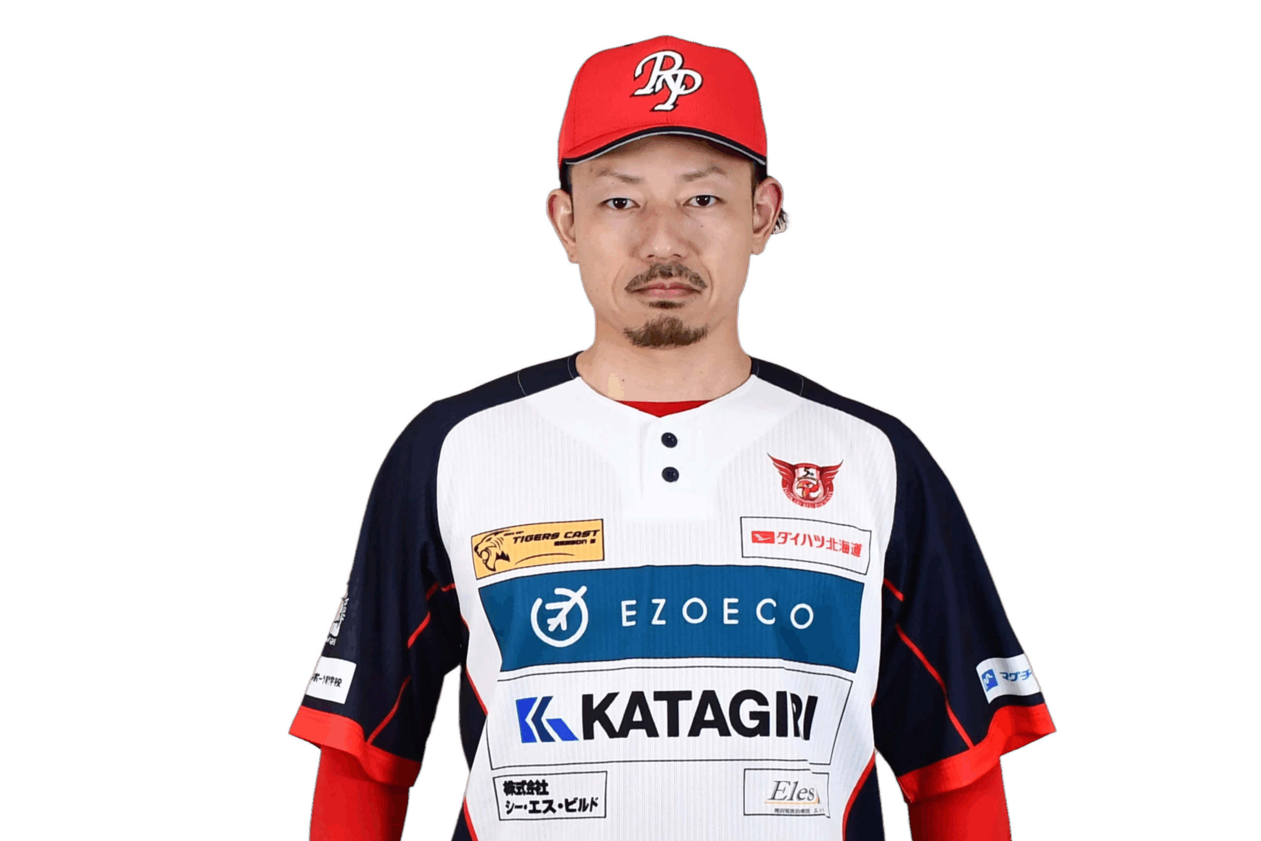 背番号87の花岡　達也コーチがユニフォーム姿で正面を向いている